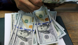 Dólar cai para R$ 5,01 com alívio nos Estados Unidos