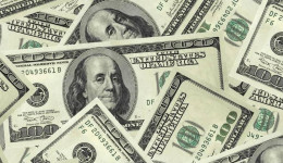 Dólar cai para R$ 4,97 após decisão do Fed